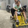 xe đua f1 cho bé yên dài 2 người ngồi